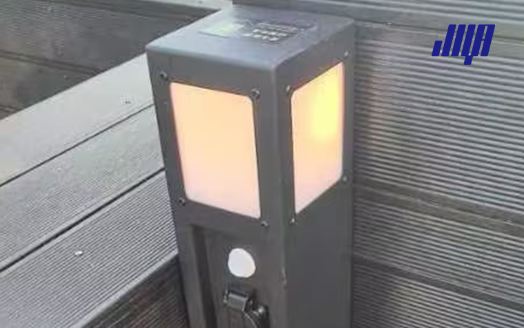 utdoor Lighting: Lamp Post Outlet Installation 48 Real‑world residential backyard scene of installed lamp post with outlet, providing outdoor lighting and convenient power source for garden equipment