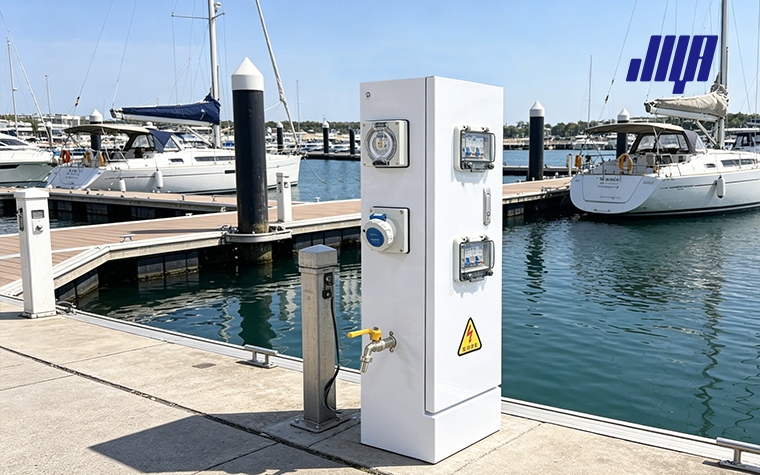 Shore Power Pedestal Maintenance: Annual Checklist 9 Technician inspecting outdoor shore power pedestal, checking casing, sockets and seals for annual maintenance