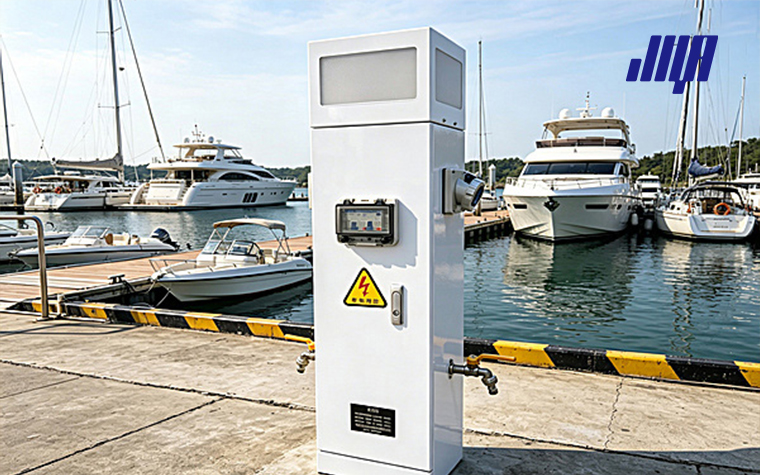 Dock power pedestal on marina pier, shore power unit providing electricity for docked boats, yachts and RV recreational vehicles