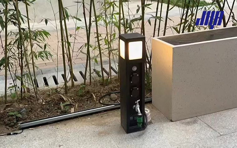 Article cover graphic for outdoor post light with built‑in outlet, showing dual‑function landscape fixture combining garden lighting and convenient exterior electrical solutions