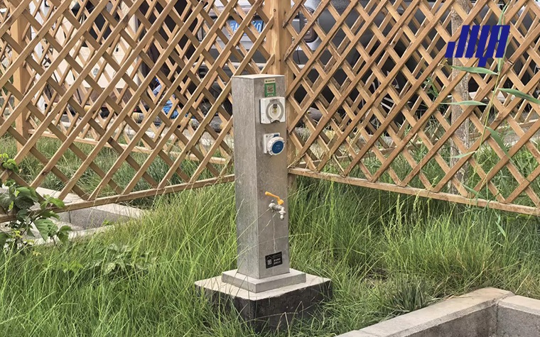 Blog cover graphic introducing power pedestal box, durable weatherproof outdoor outlet solution for campgrounds, marinas and residential exterior power supply